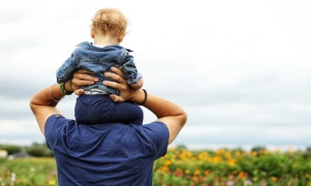 baby-sitting-on-man-s-shoulder